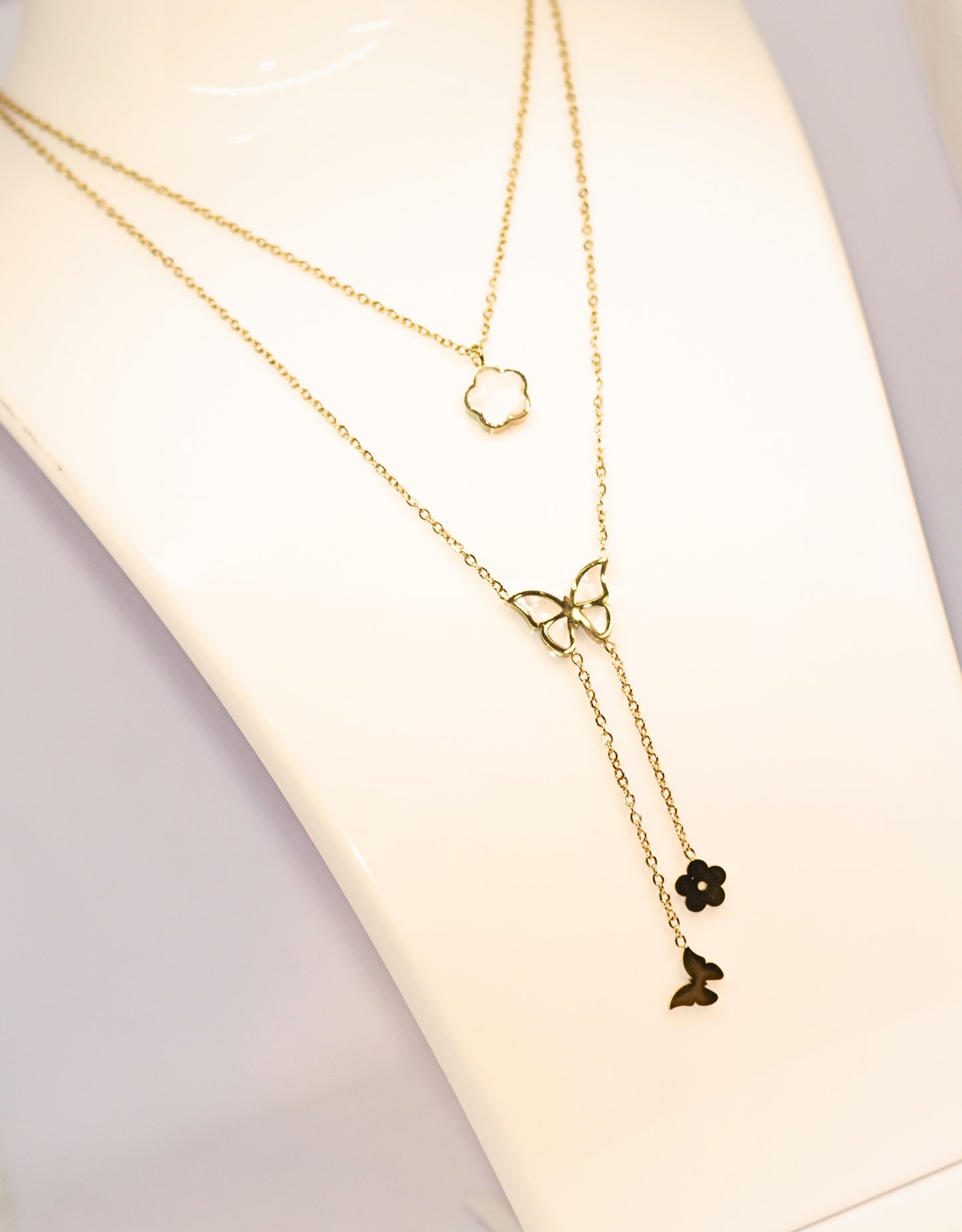 Stylish double chain with butterfly and flower pendant