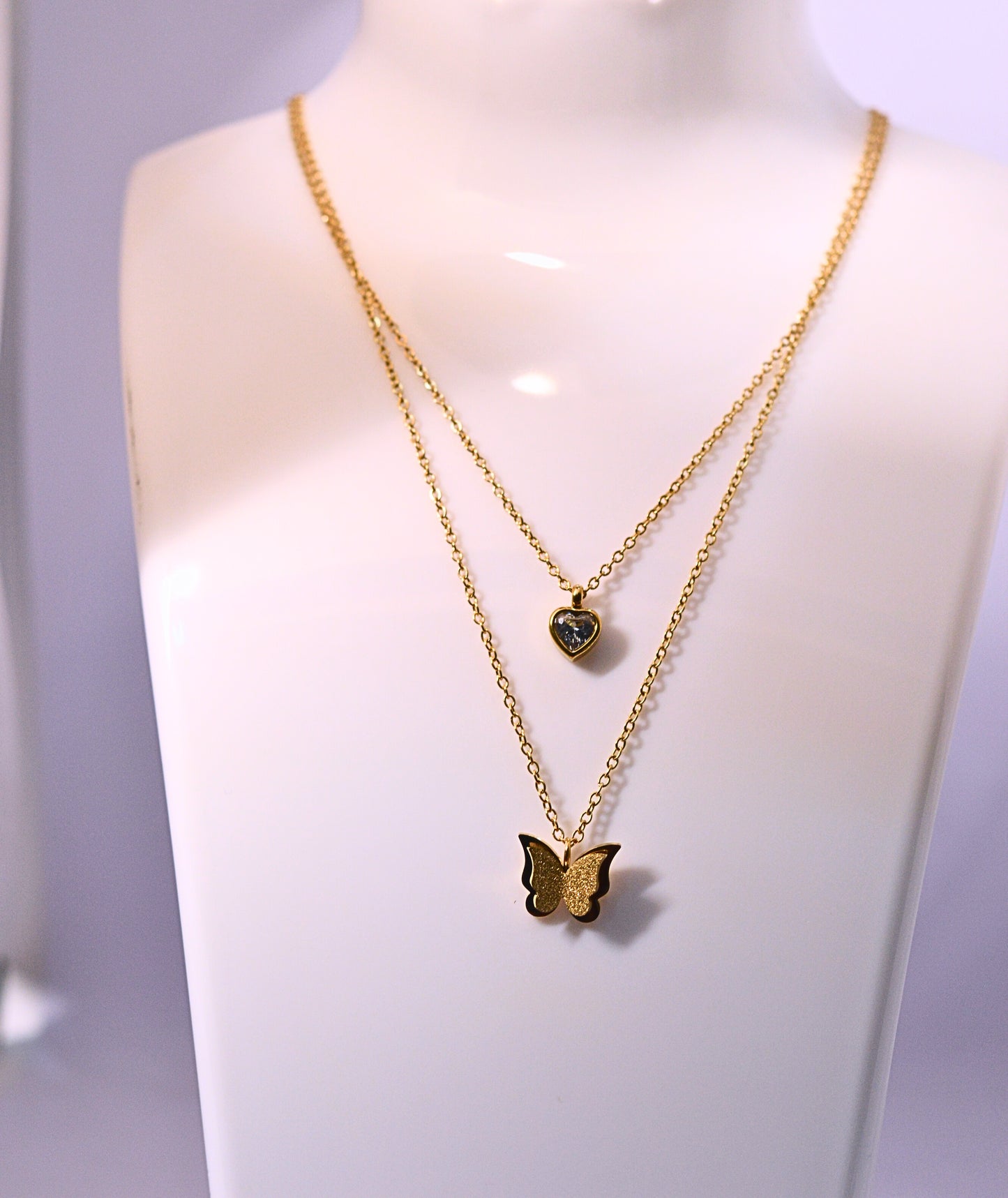 Stylish double chain with heart and butterfly pendant