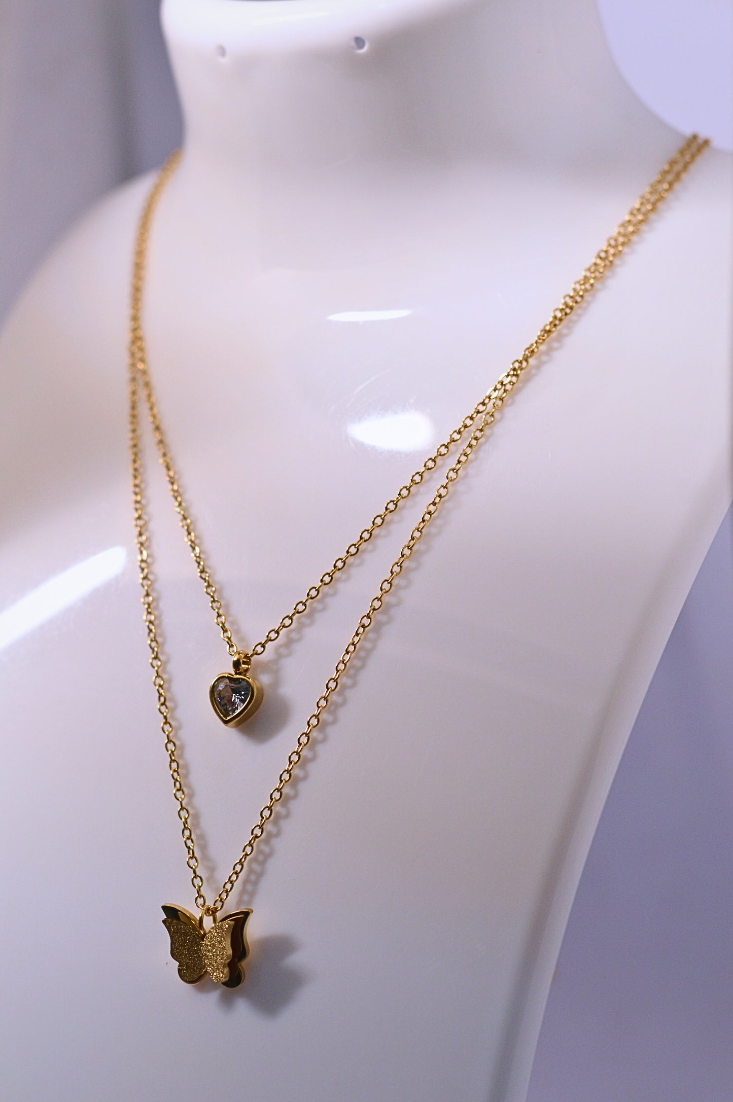 Stylish double chain with heart and butterfly pendant