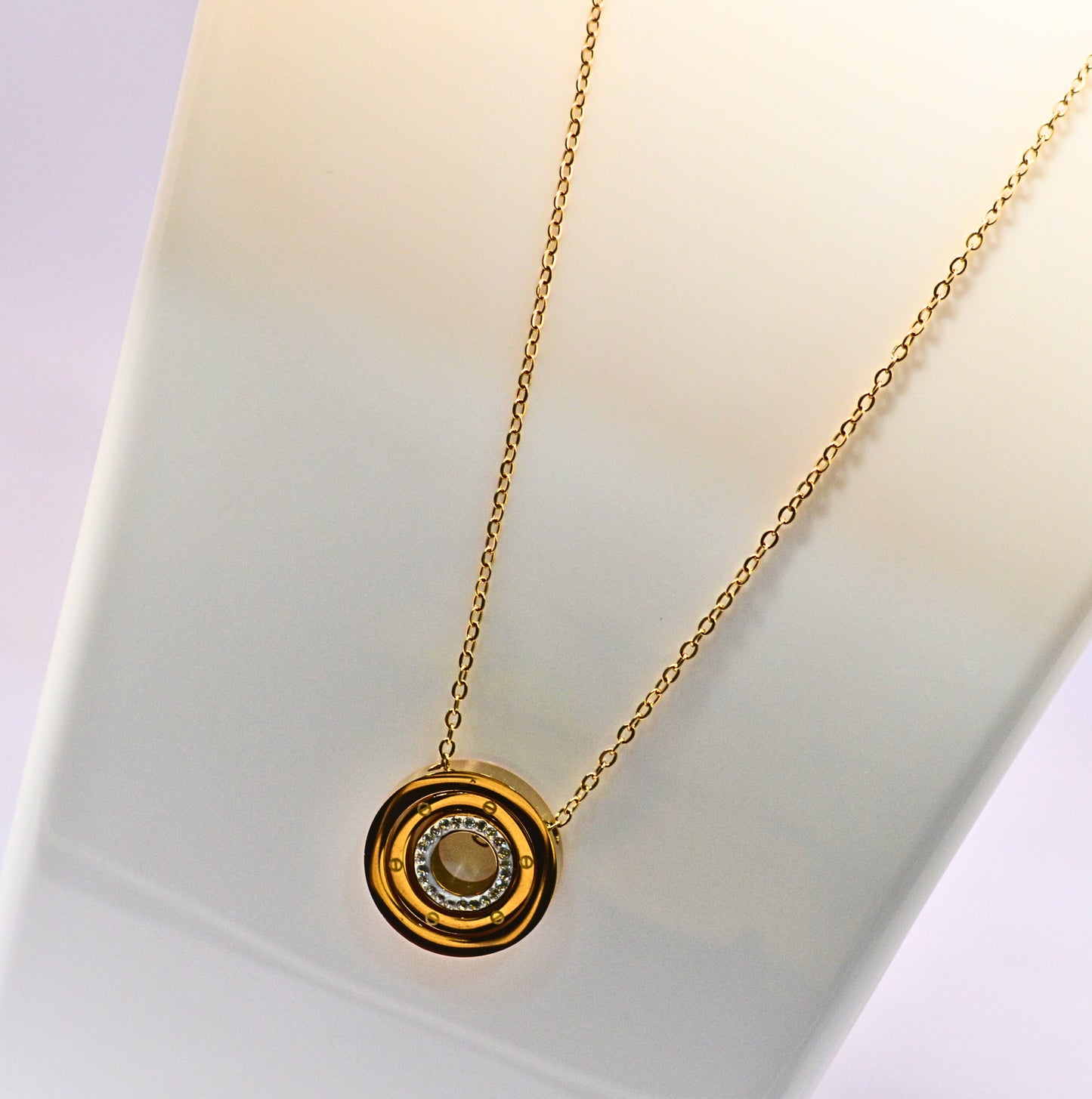 Stainless style with concentric circle pendant