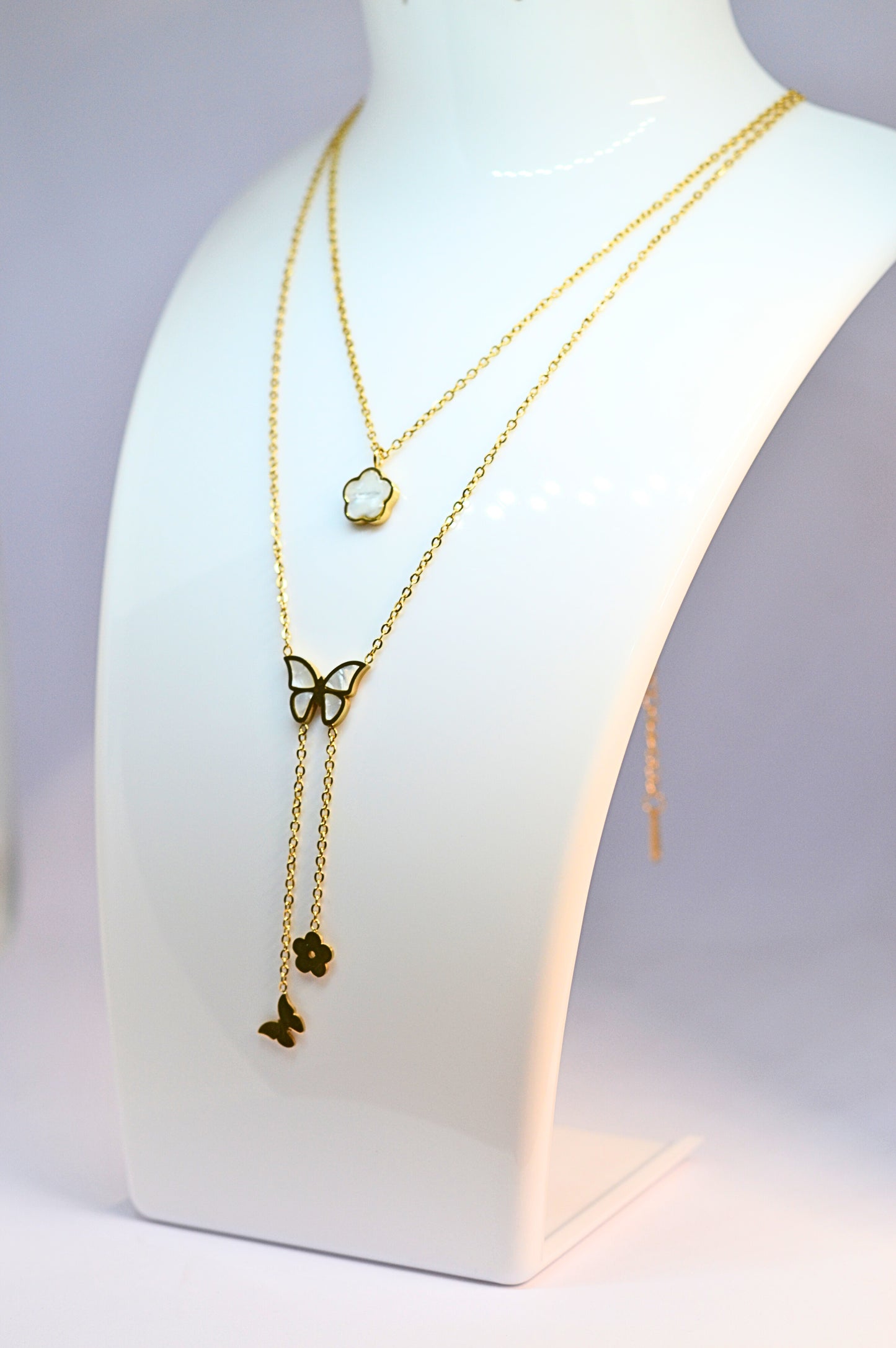Stylish double chain with butterfly and flower pendant