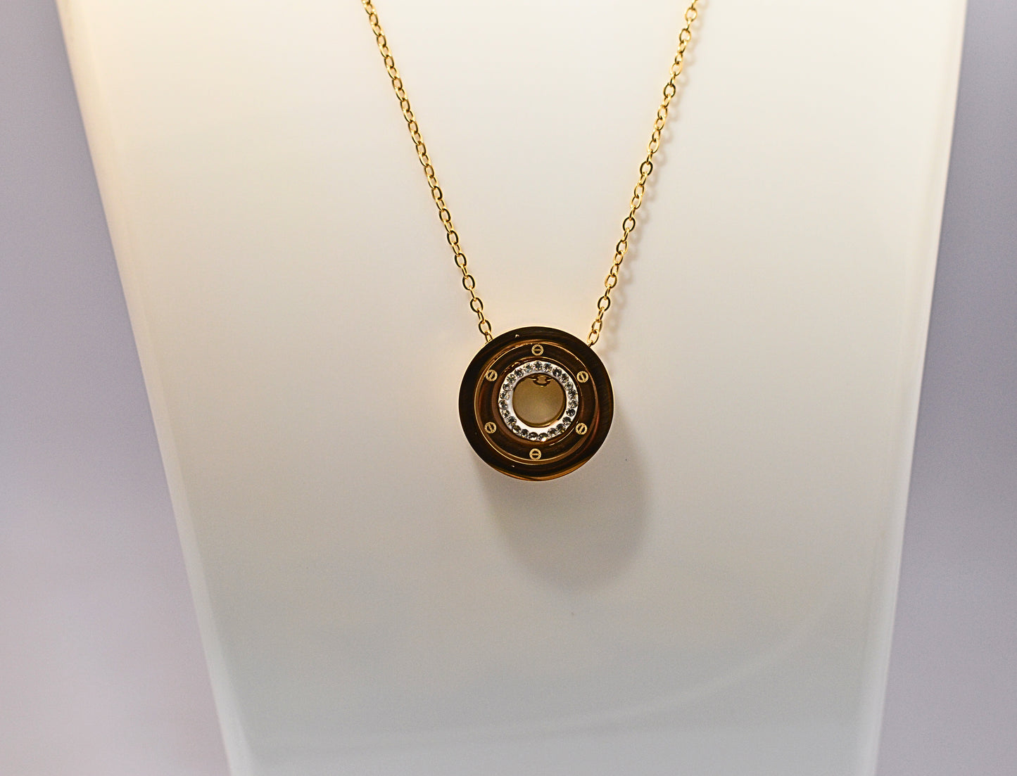 Stainless style with concentric circle pendant