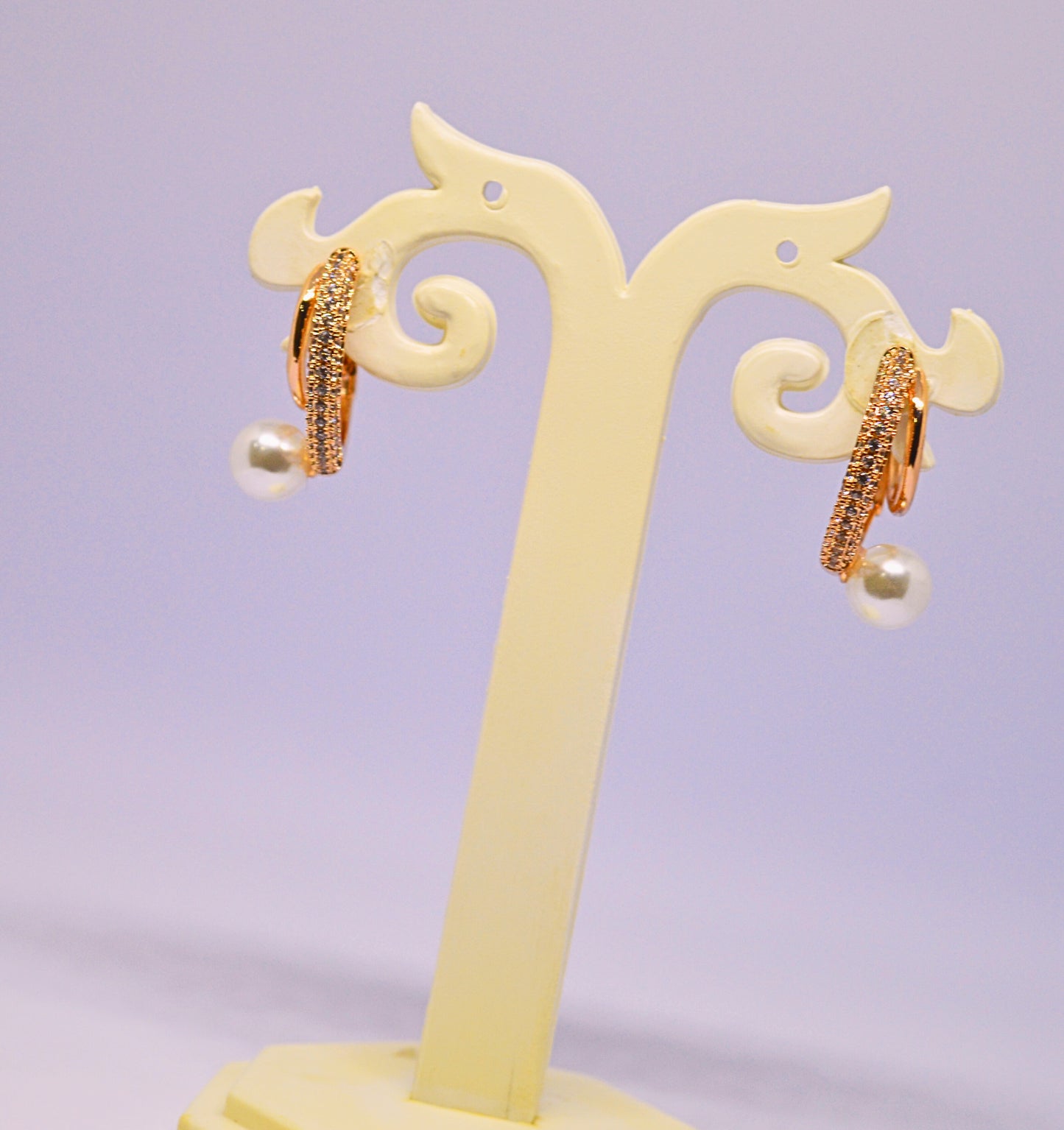 Imported stud style diamond and pearl earrings
