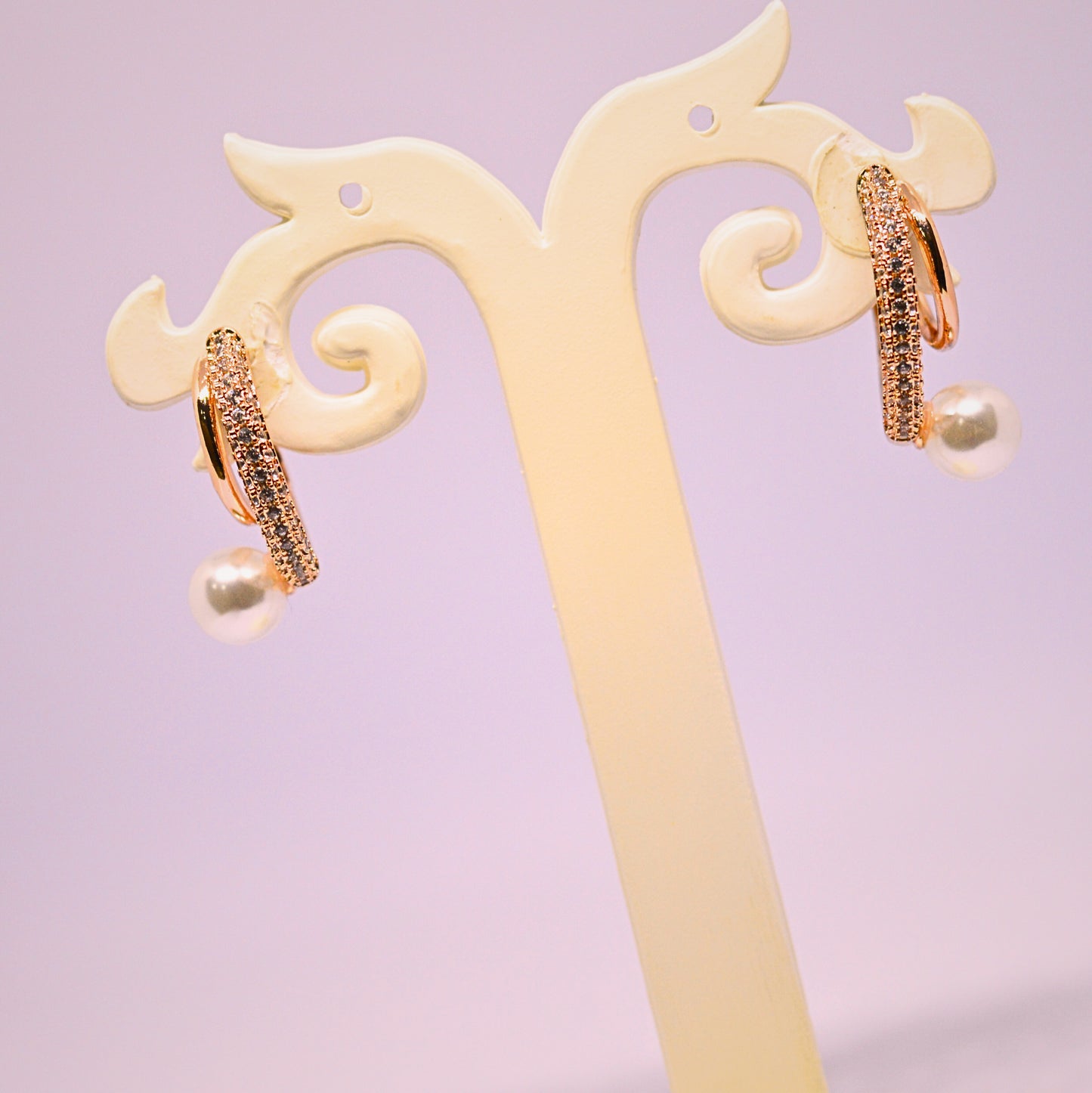 Imported stud style diamond and pearl earrings
