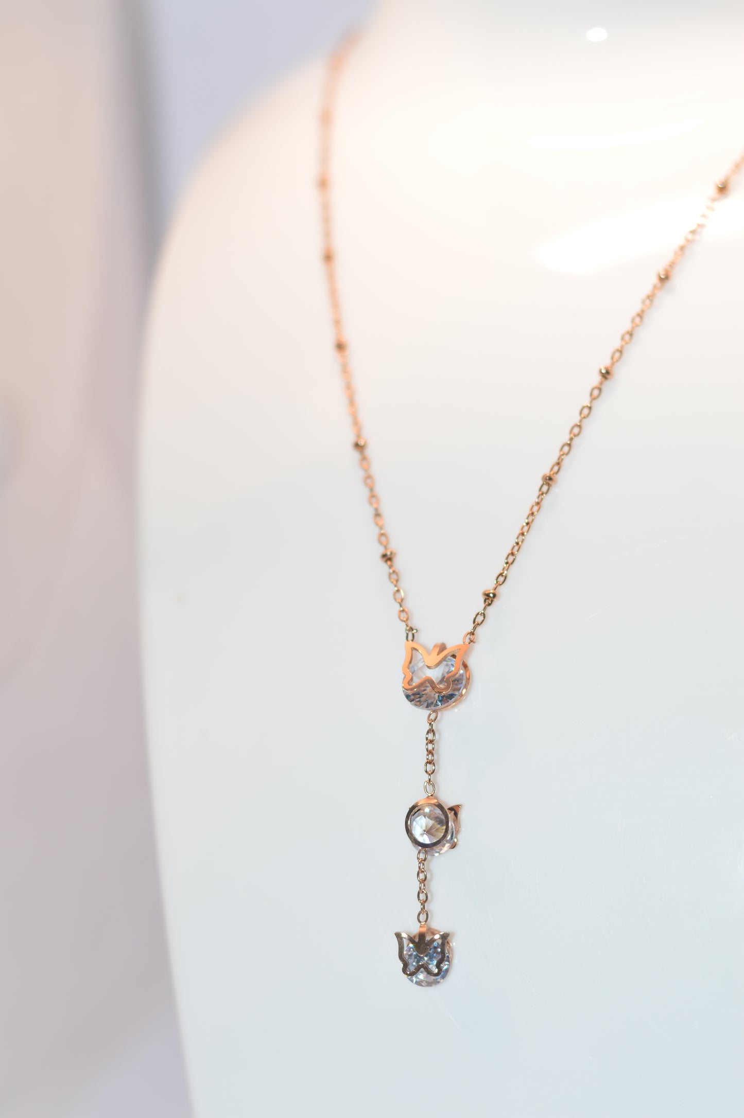 Rose gold chain with diamond and butterfly pendant
