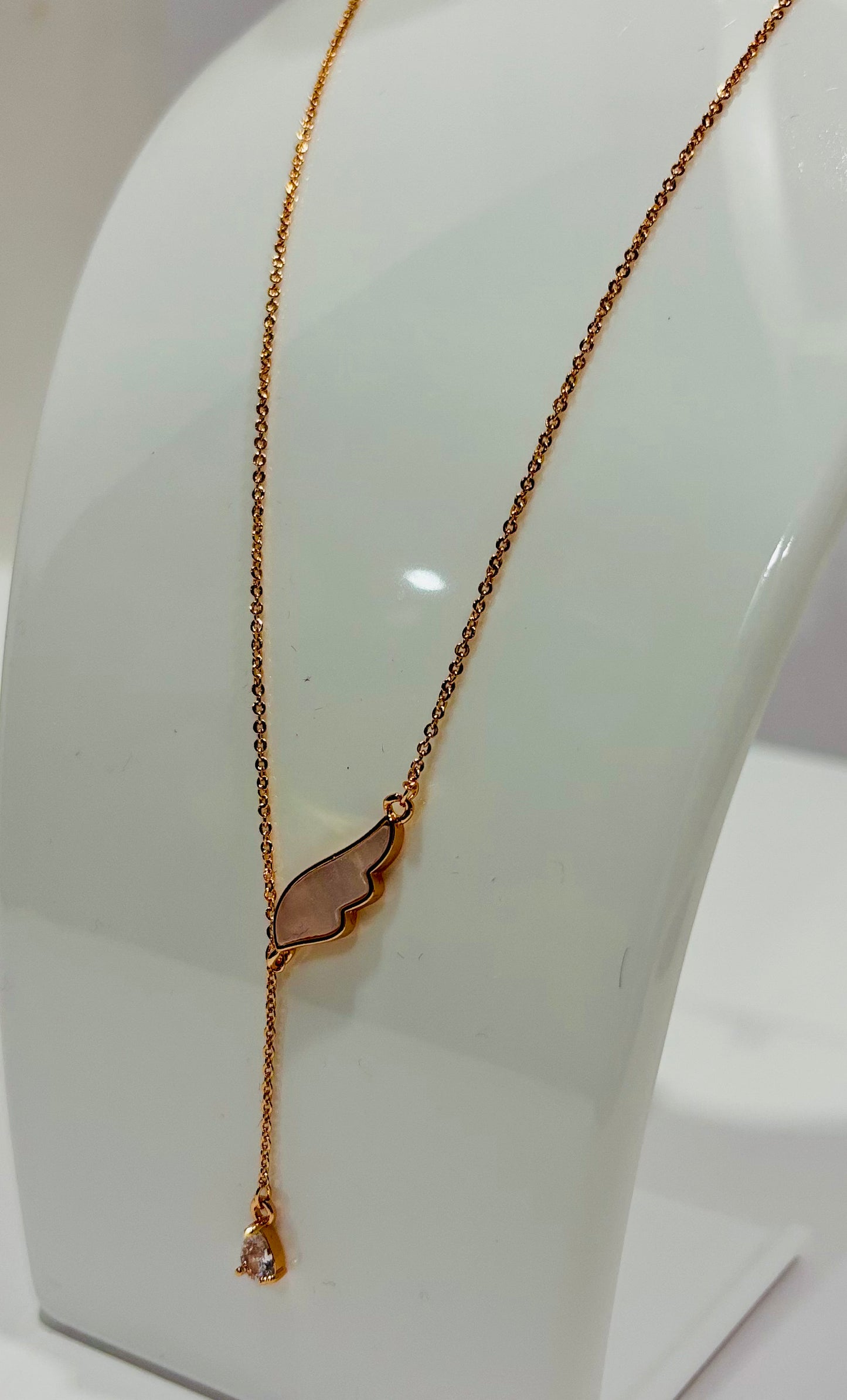 Rose gold necklace with single wing