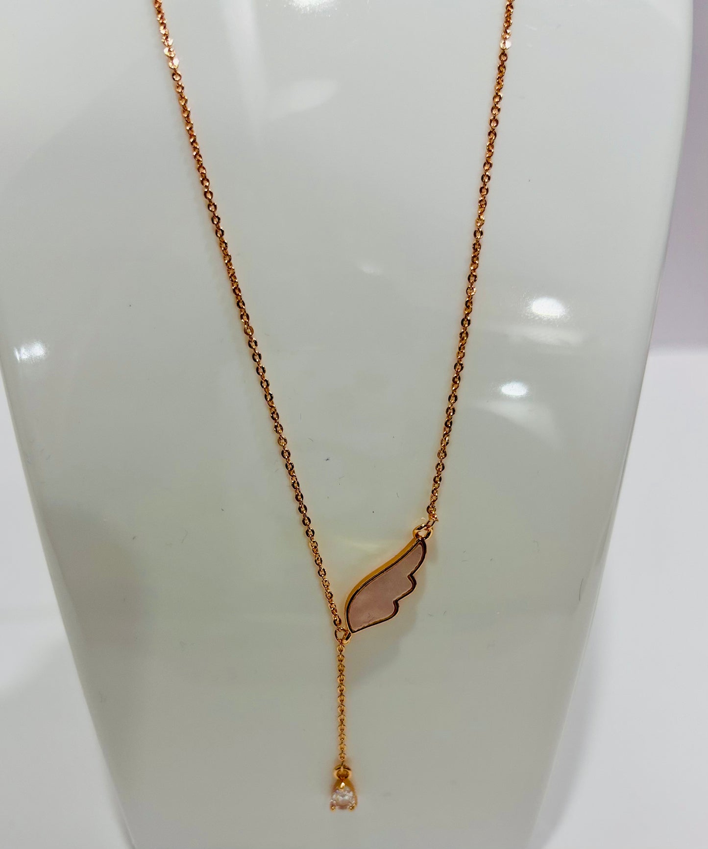 Rose gold necklace with single wing