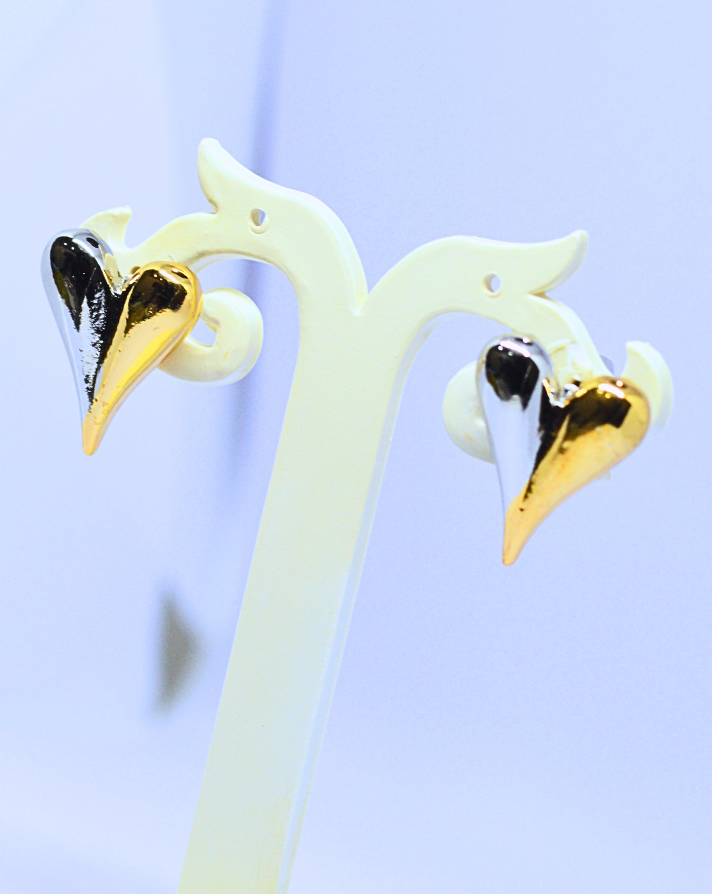 Metallic gold and silver heart design earrings