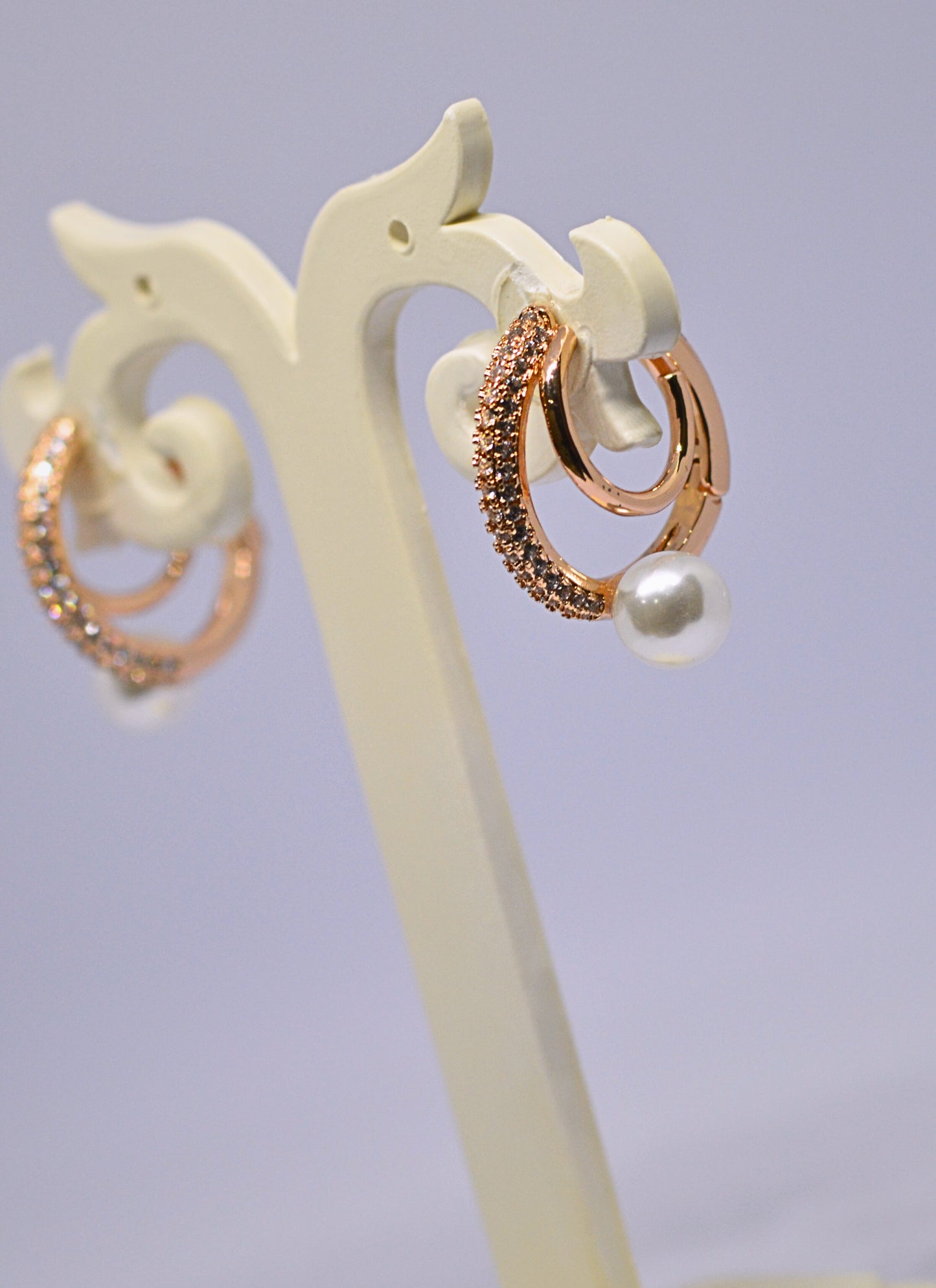 Imported stud style diamond and pearl earrings