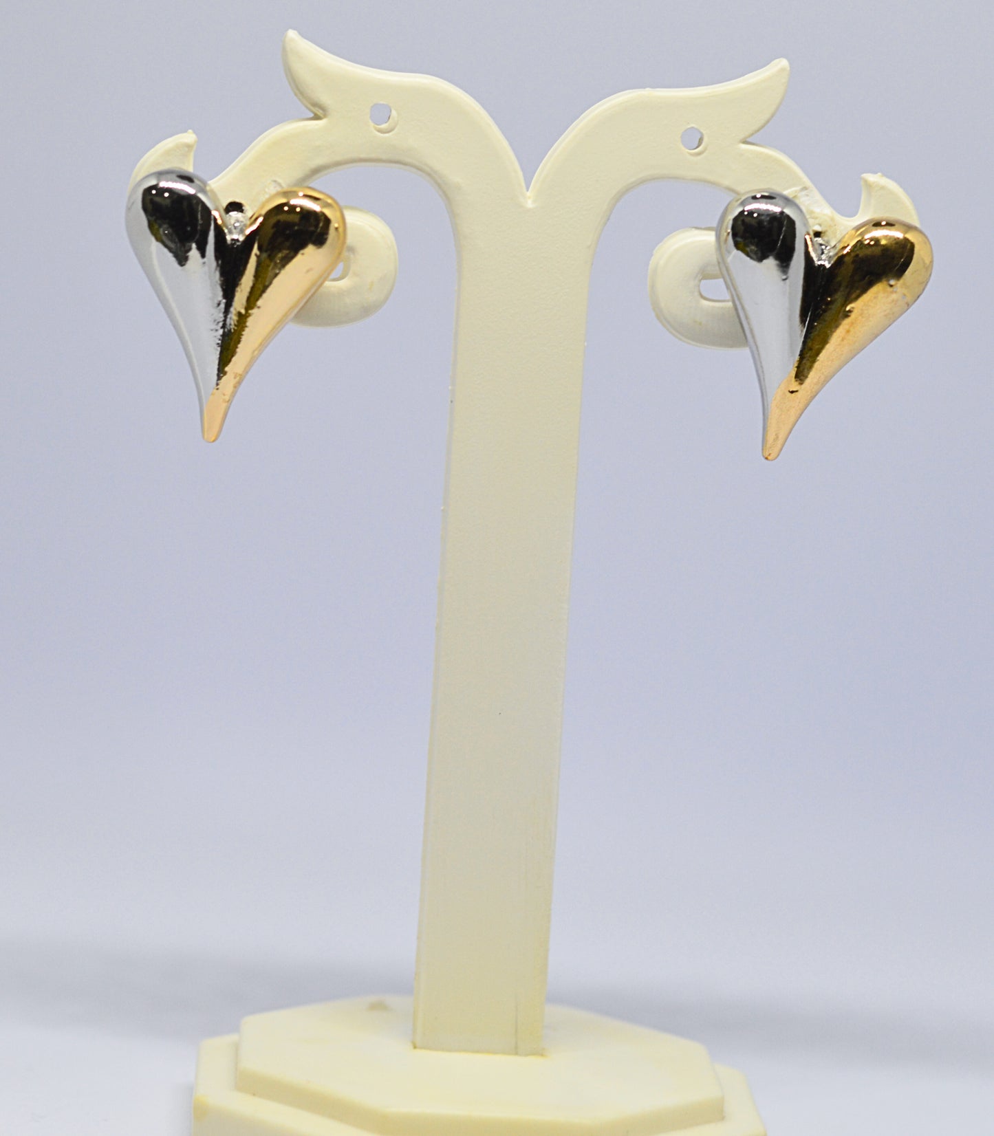 Metallic gold and silver heart design earrings