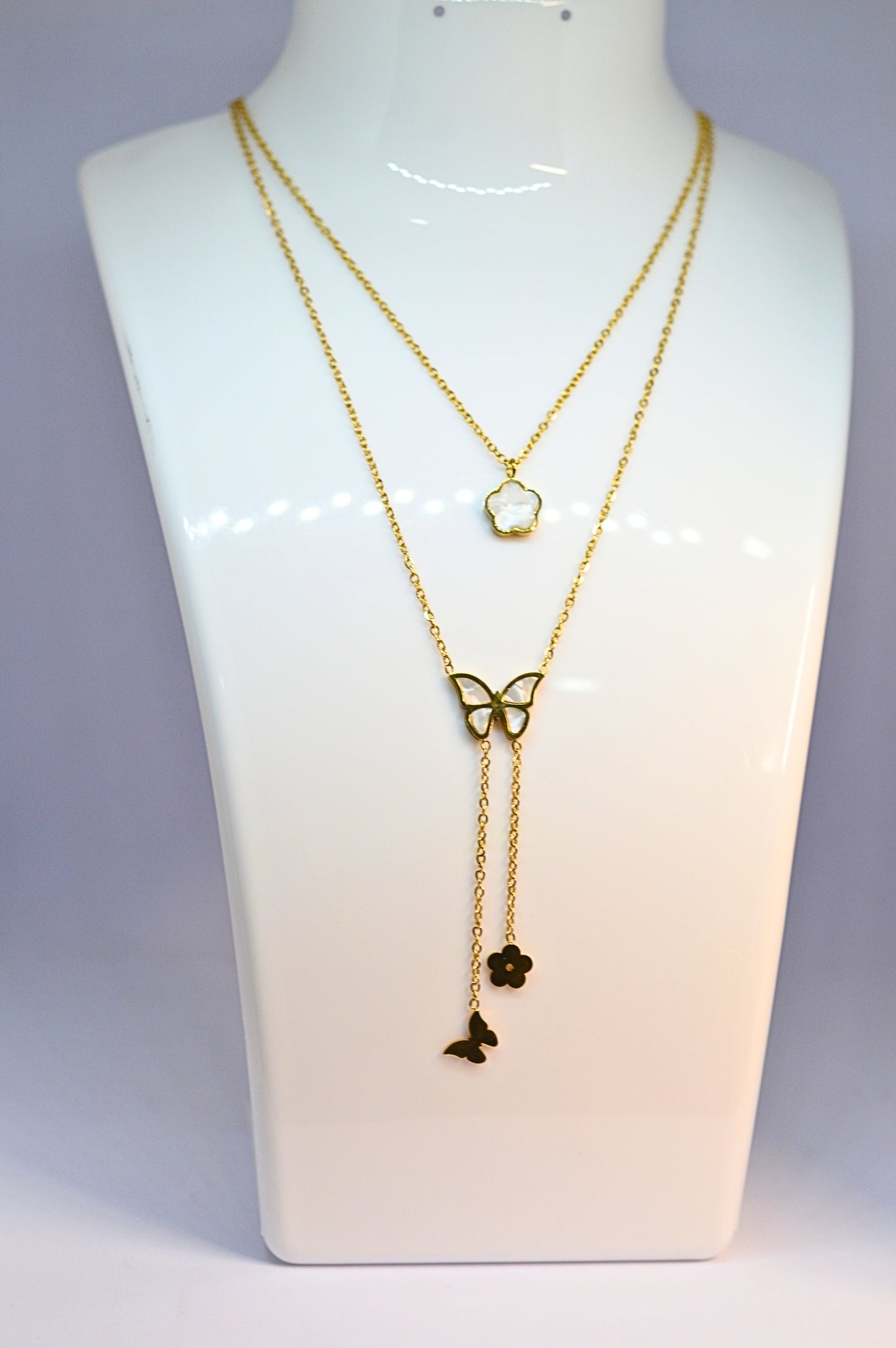 Stylish double chain with butterfly and flower pendant