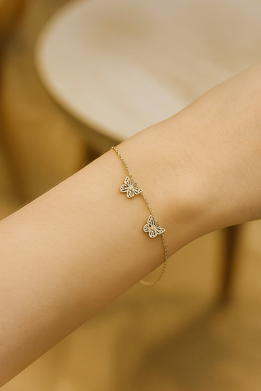 Elegant Gold Bracelet with Hanging Butterflies