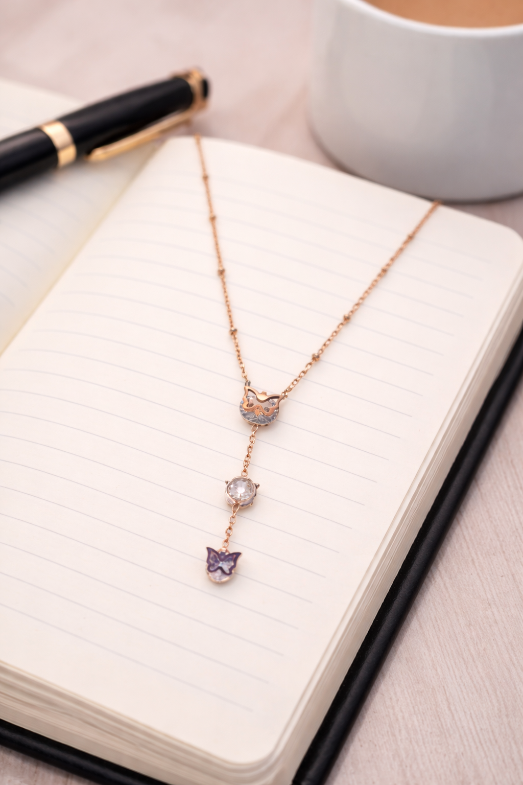 Rose gold chain with diamond and butterfly pendant