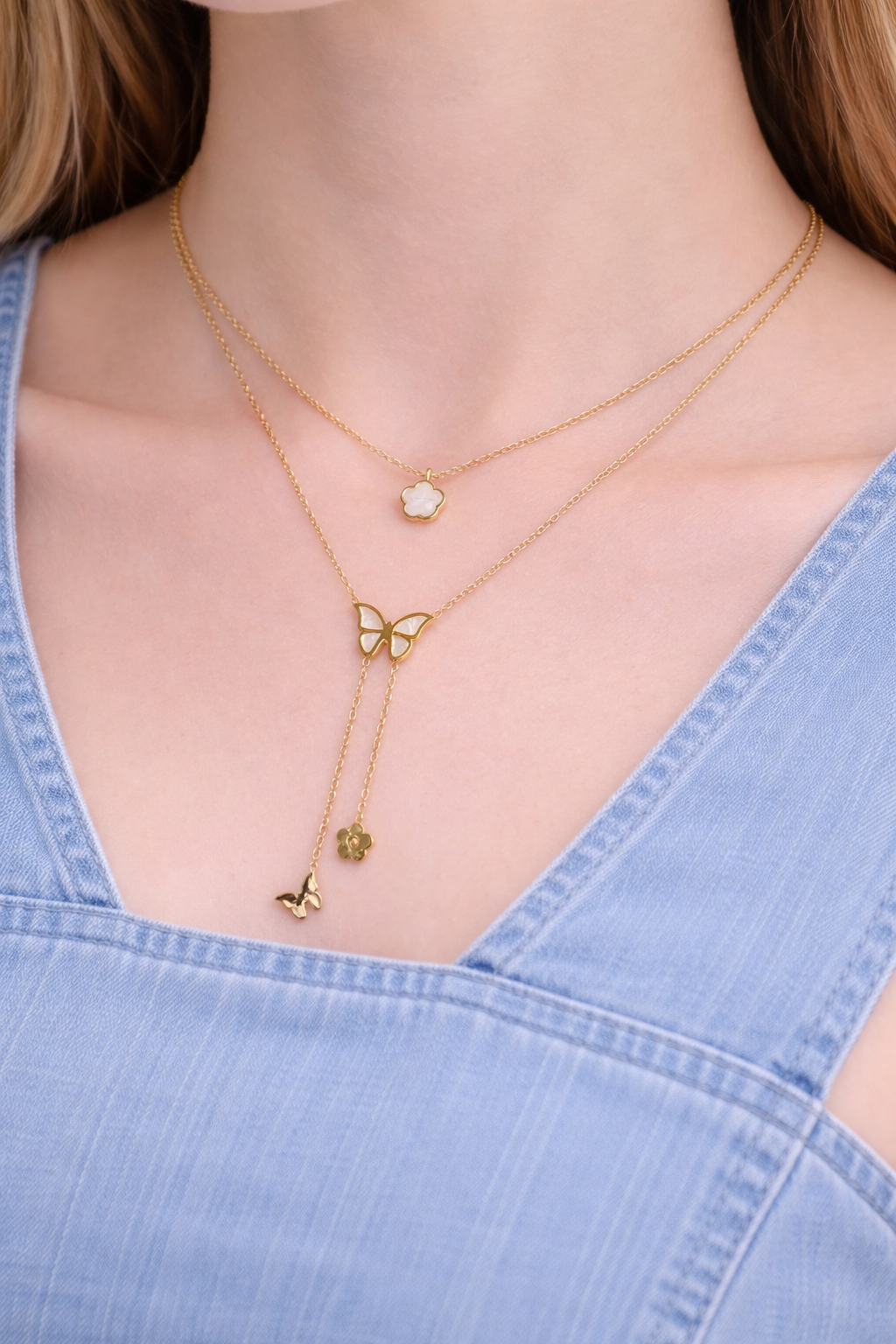 Stylish double chain with butterfly and flower pendant