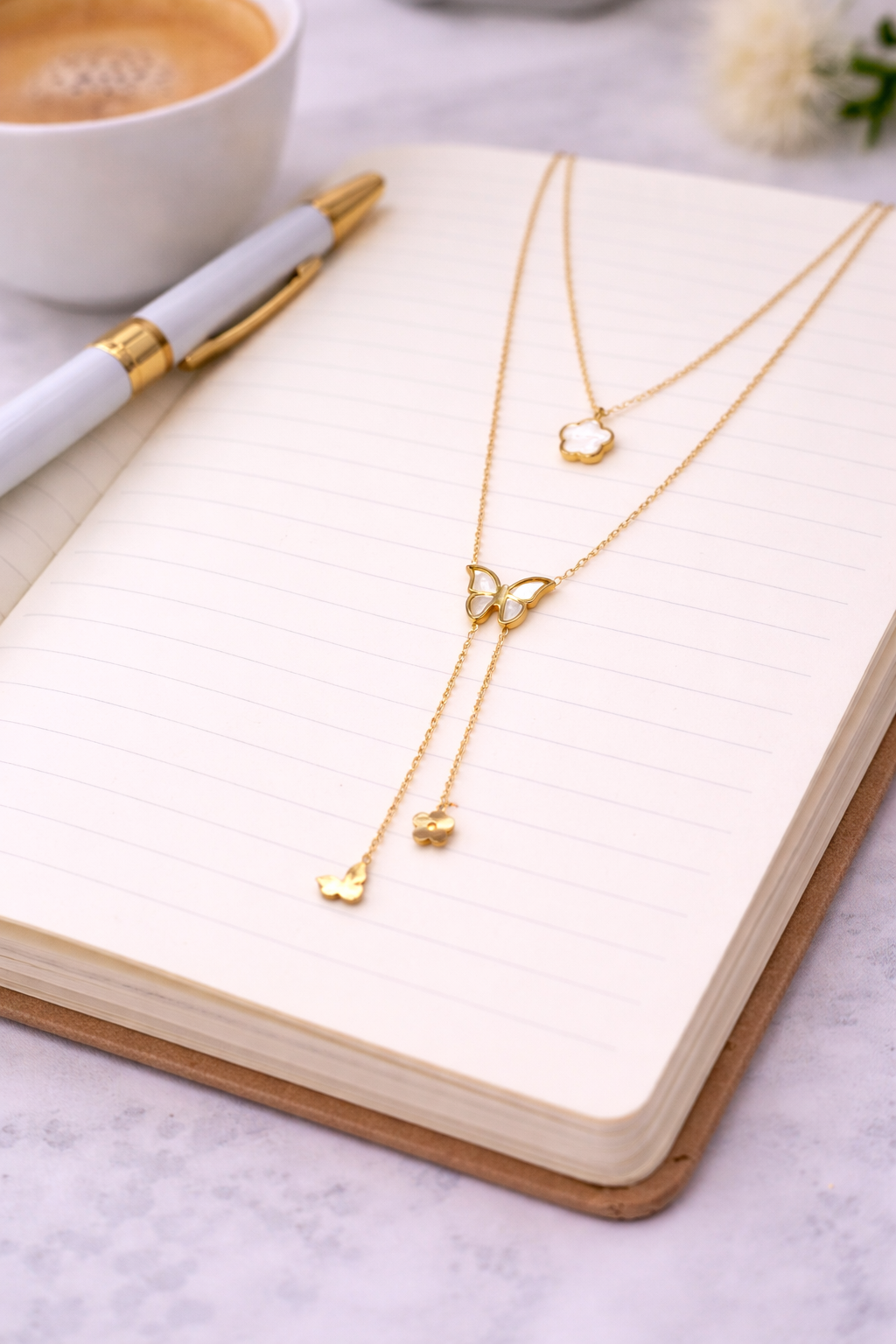 Stylish double chain with butterfly and flower pendant