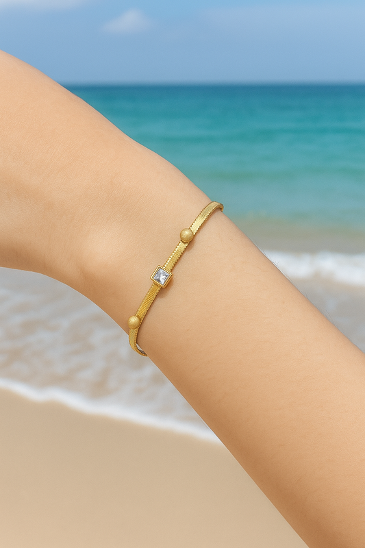 Elegant Gold Bracelet with Square Stone