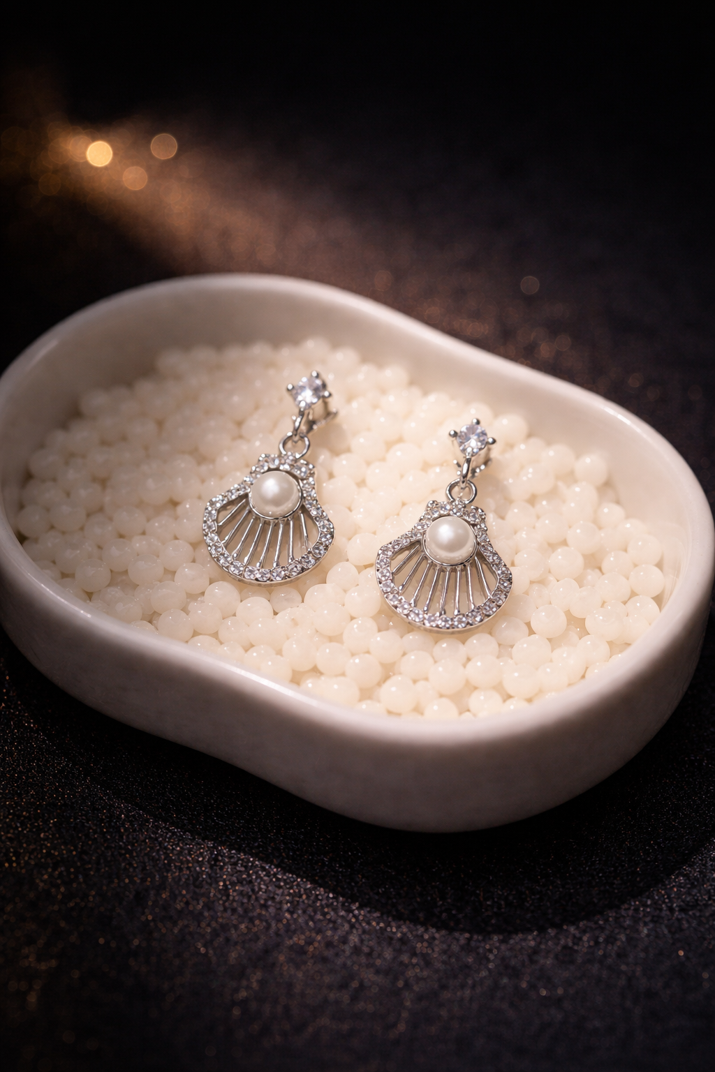 Stylish shell with pearl earrings