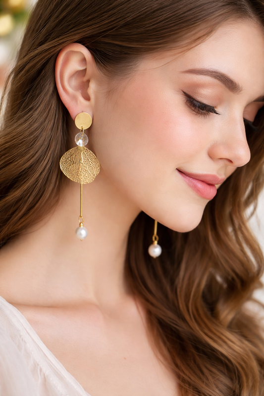 Earrings with hanging sacred fig leaf design