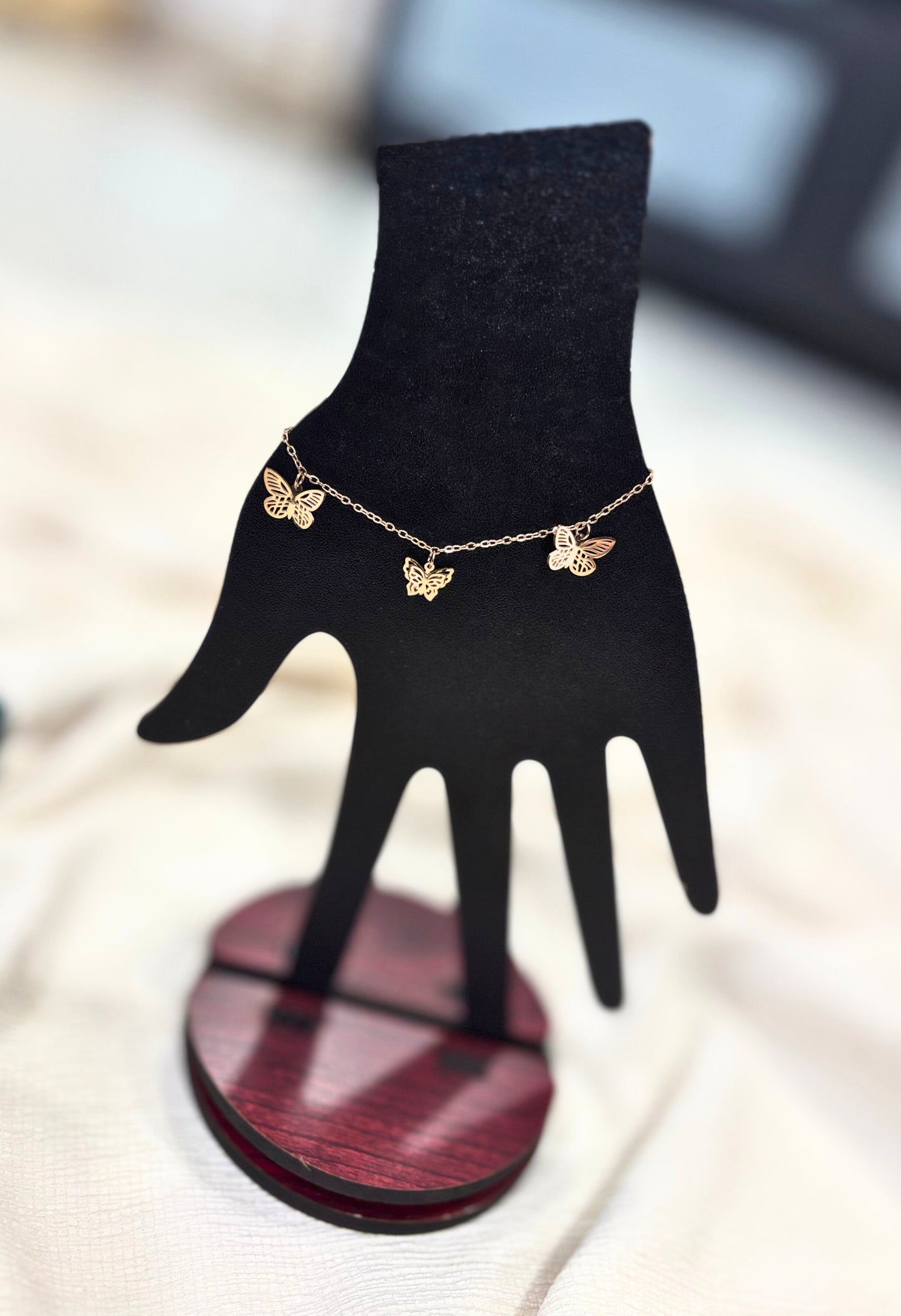 Elegant Gold Bracelet with Hanging Butterflies